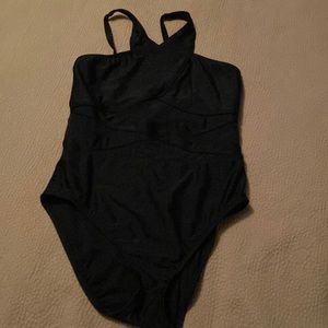 Cute black swimsuit size 10.  Sheer through stomach area.